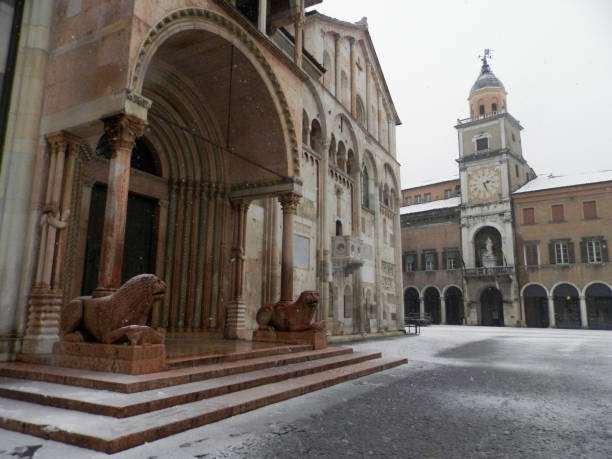istock Modena during a snowfall: piazza grande, the cathedral and the town hall. 927132160