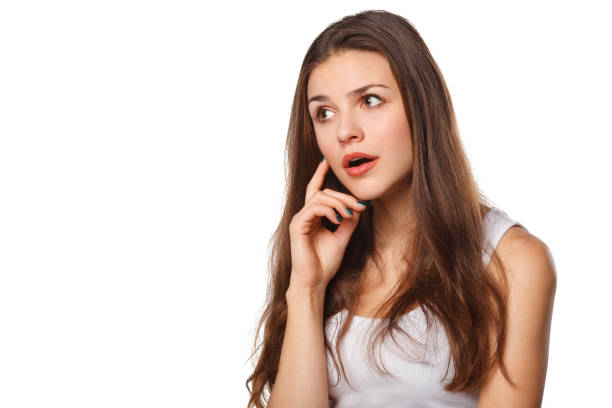 istock Young beautiful woman thinking looking to the side at blank copy space, isolated over white background 927138248
