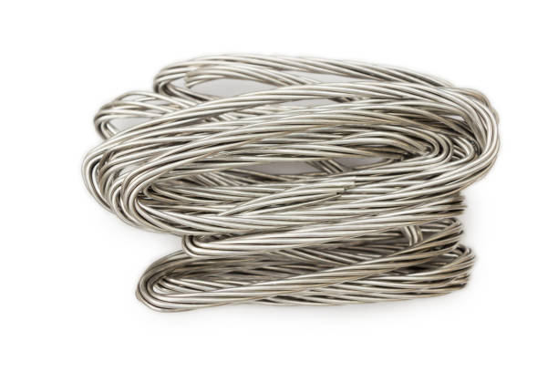 istock Steel wire.Aluminum electrical power cable,silver metal isolated on white  background 927142430