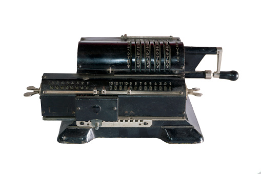 ancient mechanical calculator (arithmometer) isolated