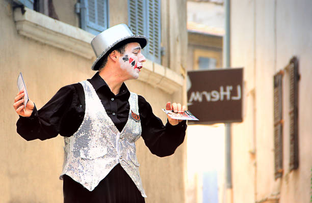 Avignon, France - July 19, 2014: Actor on stilts advertising his performance during famous theatre festival from July 4 to 27, 2014 in Avignon, south of France. The Avignon Festival is today one of the most important contemporary performing arts events in the world