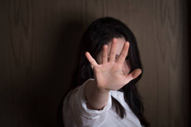 istock Woman with hand stretched as a stop symbol 927156118