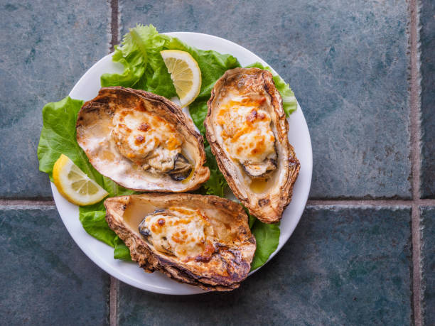 Grilled oysters stock photo