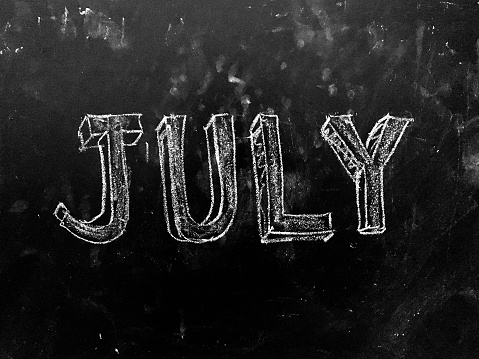 July Month Handwritten on Blackboard as JPG File