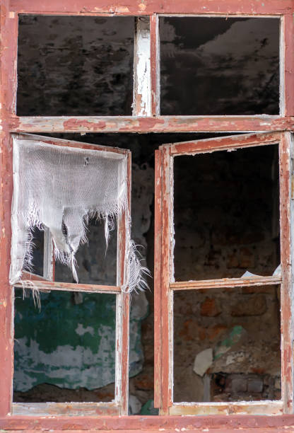 istock Wood window in an abandoned old building. 927170290