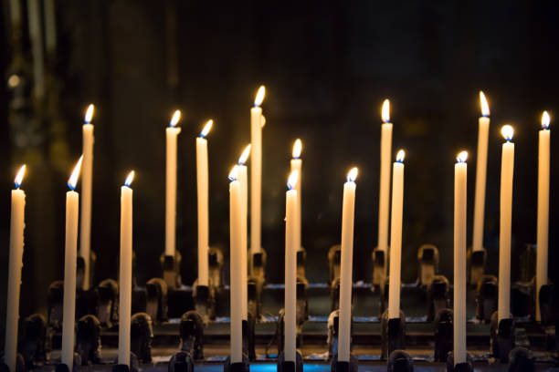 istock Candles in the church 927178078