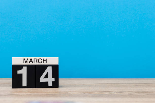 istock March 14th. Day 14 of march month, calendar on light blue background. Spring time, empty space for text, mockup 927178460