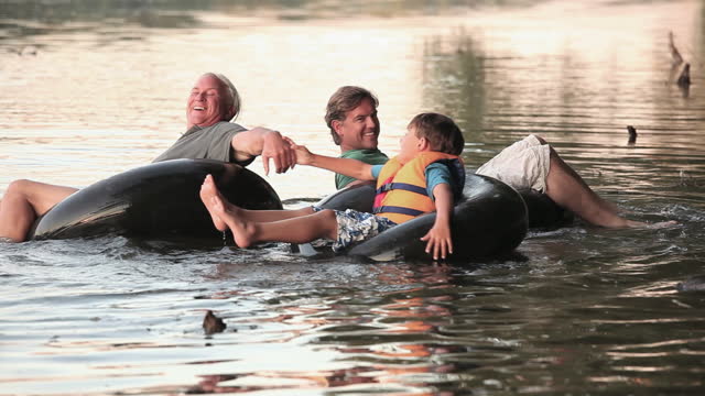 Family tubing down a river