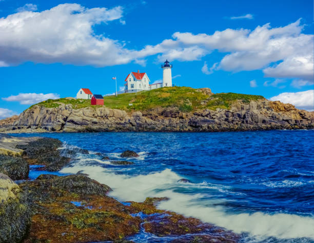 istock Early morning view of the lighthouse at Cape Neddick ('Nubble') Light Maine 927190848