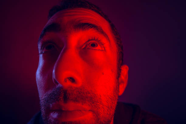 istock Man with hope facial expression looking up 927194464