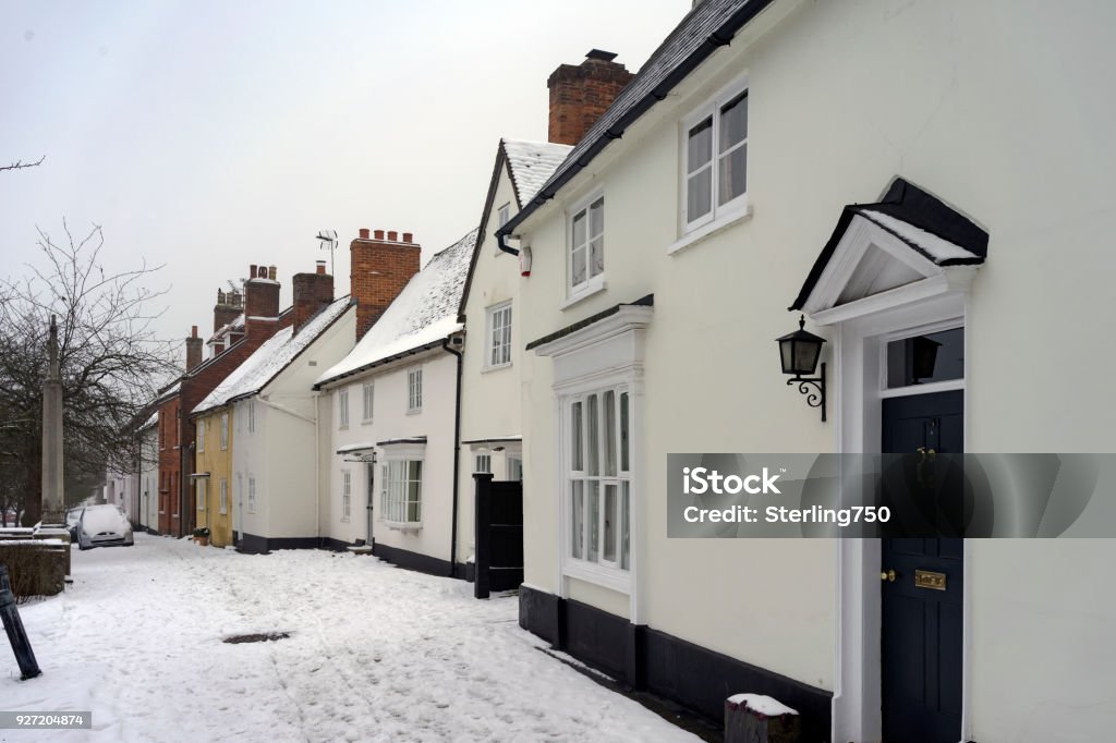 Odiham in Hampshire, UK in winter Snowy winter street scene at Odiham in Hampshire, UK Ancient Stock Photo