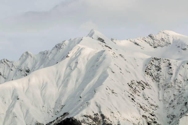 istock mountain peaks white snow sochi in winter 927209786
