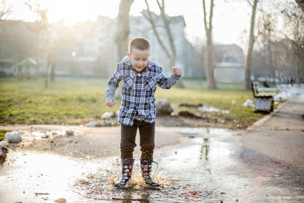 istock Jumping in the puddles 927216140