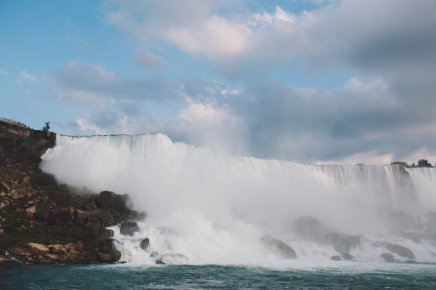 istock Scenic View Of Waterfall Against Sky 927219112