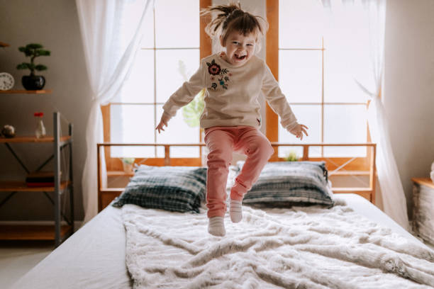 istock Happy child in bed 927233276