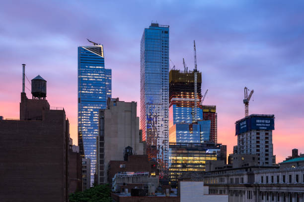 New York City, NY, USA - June 8, 2017: The Hudson Yards construction site with 30 Hudson Yards under construction, the completed 10 Hudson Yards and  Eugene skyscrapers at sunset. Midtown, Manhattan