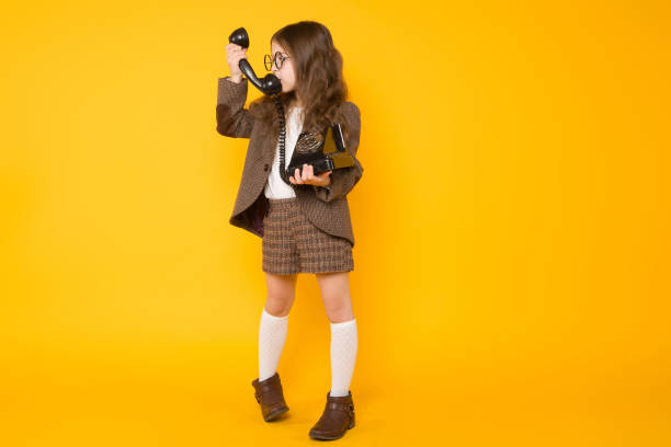 little girl with telephone - preschooler portrait family outdoors imagens e fotografias de stock