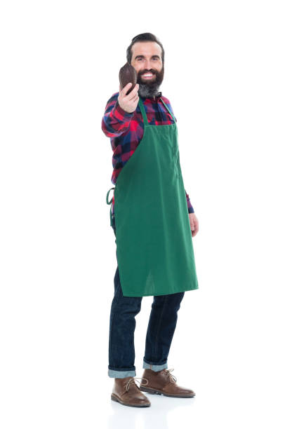istock Male artisan holding cocoa seed for chocolate making 927257552