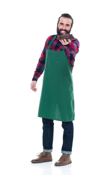 istock Male artisan holding cocoa seed for chocolate making 927257734