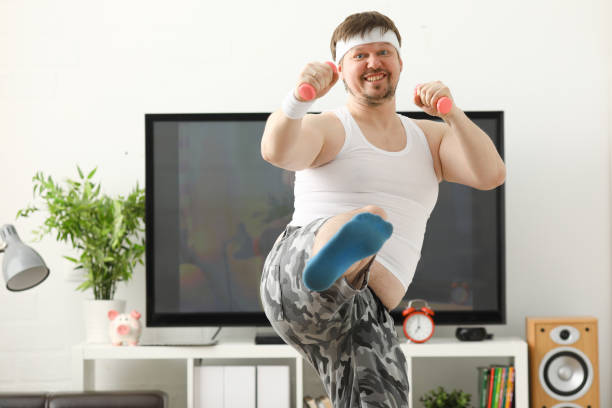 istock Young handsome man in shorts and 927258398