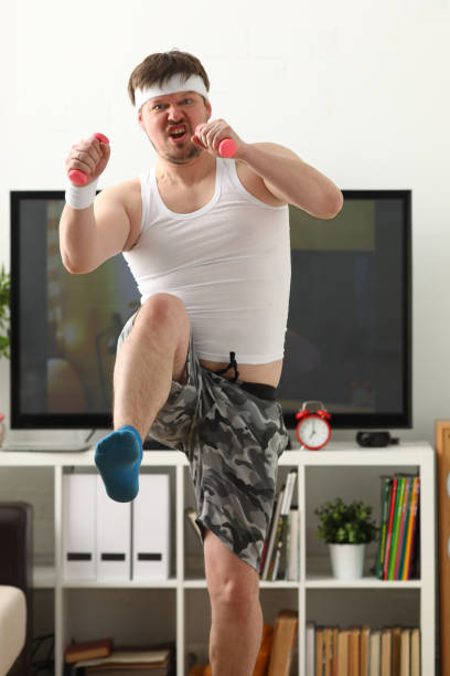 istock Young handsome man in shorts and 927258410