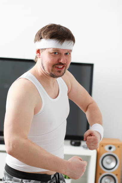 istock Young attractive man engaged in fitness 927258432