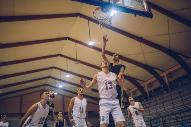 istock Basketball players playing basketball 927263144