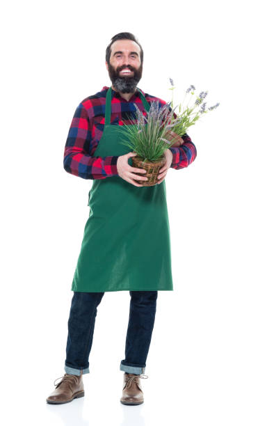 istock Male florist holding plants 927264208