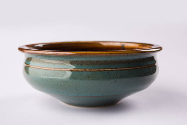 istock Empty green ceramic serving bowl, isolated over white or gray background 927271596