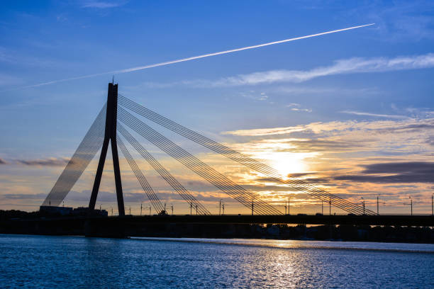 istock The sunset in Riga, bridge across Daugava (Western Dvina) river, Latvia 927273610