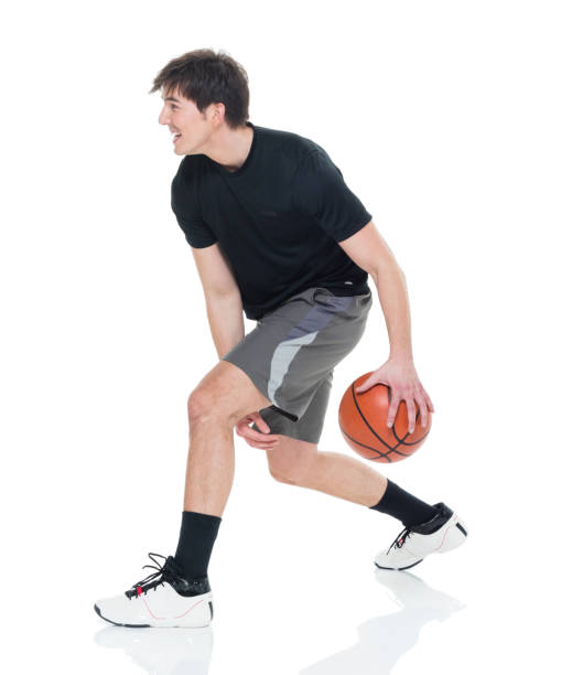 istock Handsome young man with a basketball 927274412