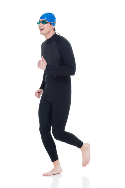 istock Young male triathlete running 927274482