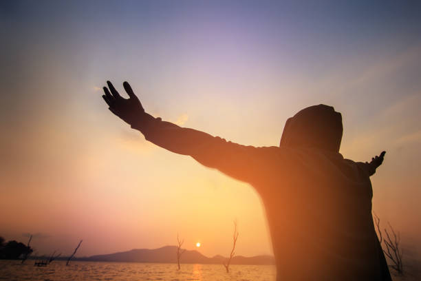 istock man with open arms worship christian. Eucharist Therapy Bless God Helping Repent Catholic Easter Lent Mind Pray. Christian concept background. 927274542
