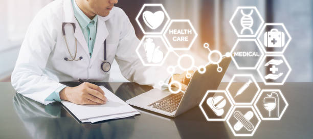 istock Medical concept - Doctor on Computer with Icons 927274672