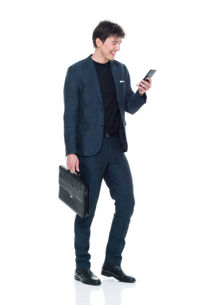 istock Attractive businessman using his smart phone 927277498
