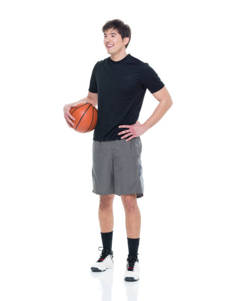istock Handsome young man with a basketball 927277544
