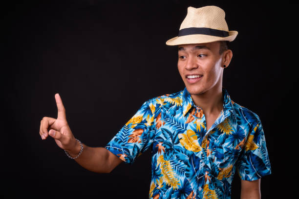 istock Young handsome Indian tourist man ready for vacation against black background 927277666