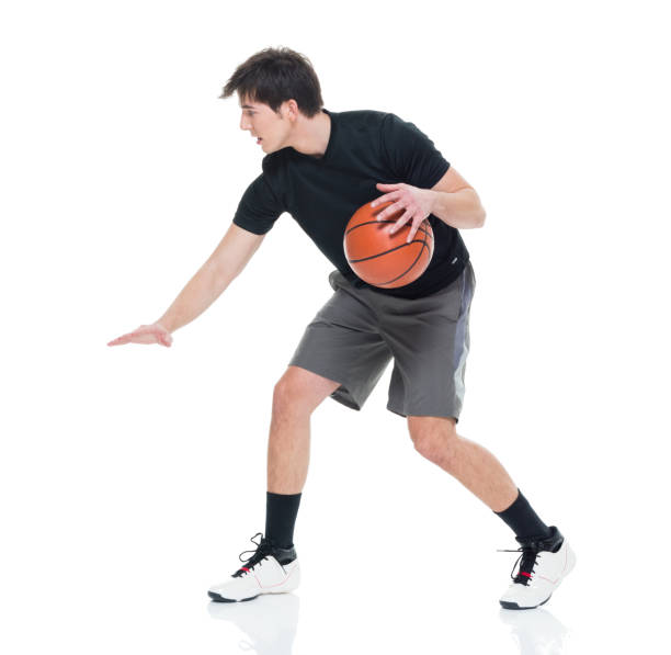 istock Handsome young man with a basketball 927280108