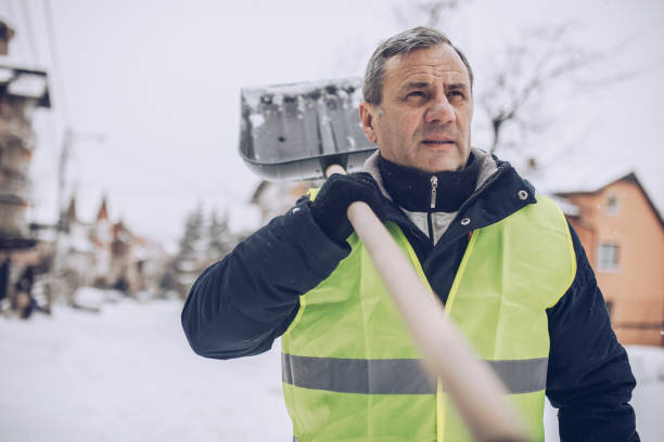 istock Man shoveling snow in winter 927281562