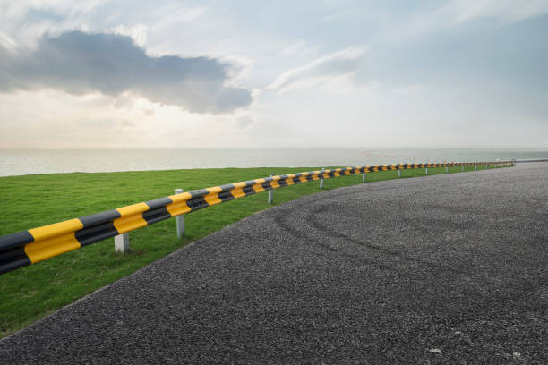 istock empty road with cityscape in modern city 927283070