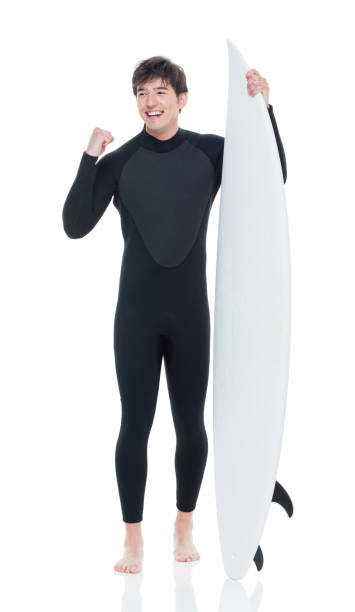 istock Young handsome male surfer is excited 927283514