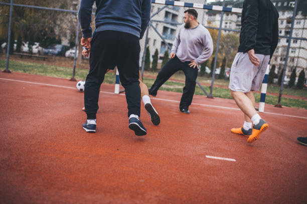 istock Friends Playing Urban Soccer 927298400