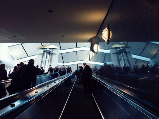 istock Going up the airport escalators 927305760