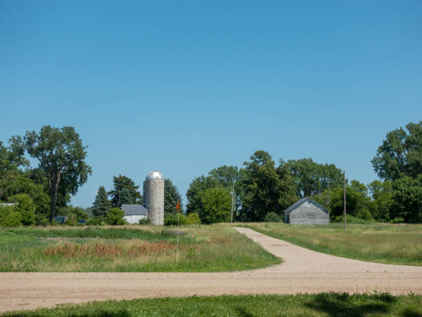 istock Driveway Leading to Farm 927305840