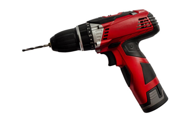 cordless drill  on white  background - drill red work tool power imagens e fotografias de stock
