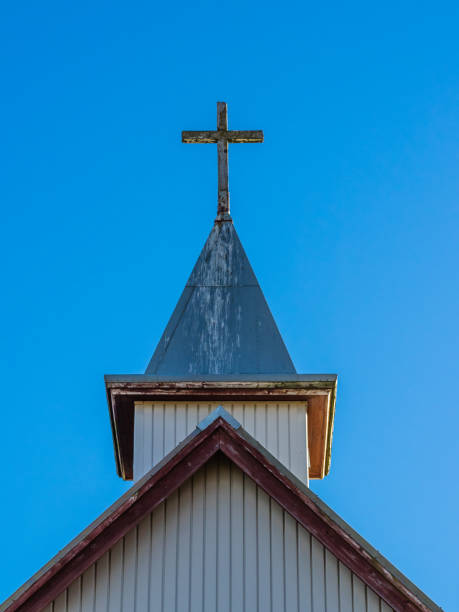 istock Low-Angle View of Steeple and Cross 927306138