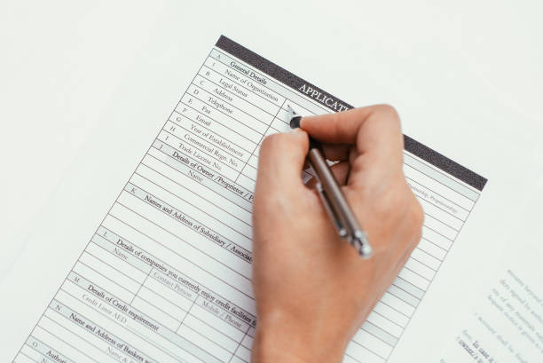 istock Female hand writing with pen 927319670