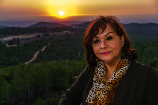 istock Senior Hispanic woman sunset portrait 927320116