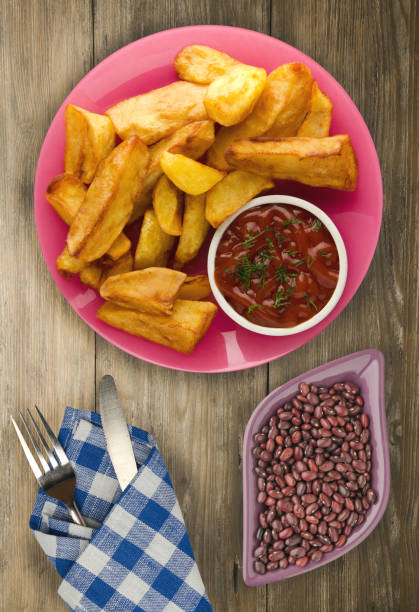 istock fry potatoes on a wooden background 927327376