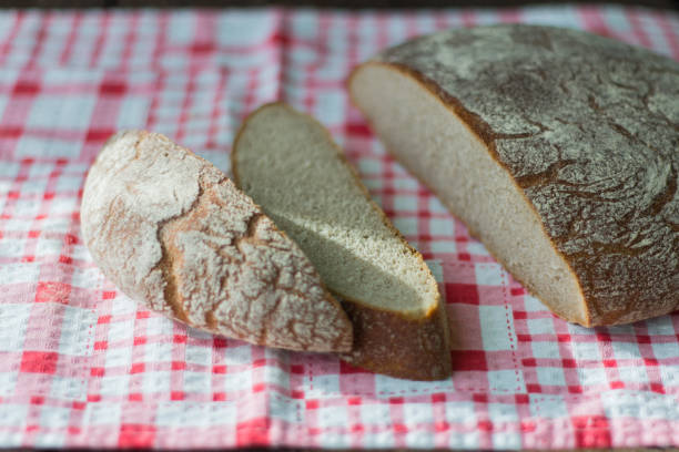 istock fresh rustic bread made of grey flour on the table 927328012